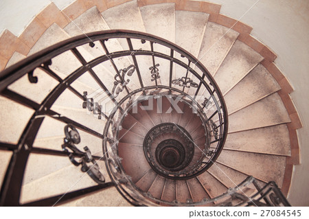 spiral staircase in an old house spiral staircase in an old house 27084545