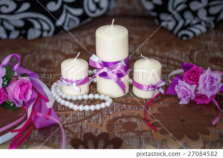 Wedding decoration, candles with purple ribbon Wedding decoration, candles with purple ribbon 27084582
