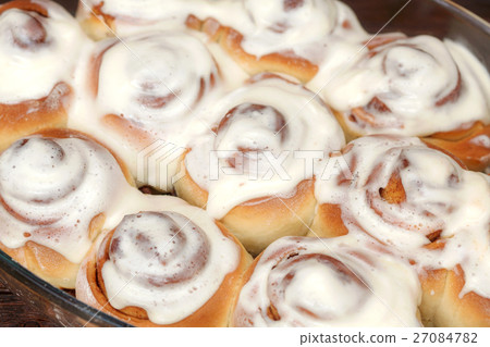 Stack of freshly cinnabon, French buns with 27084782