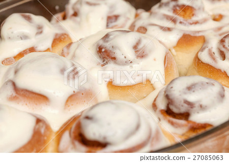 Stack of freshly cinnabon, French buns with 27085063
