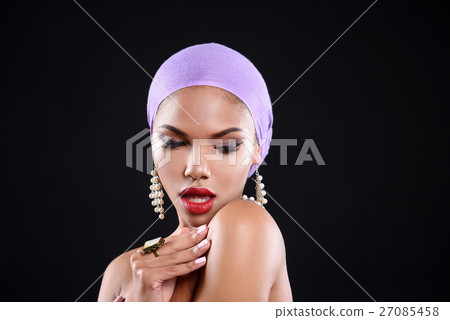 Passionate girl is looking down Passionate girl is looking down 27085458