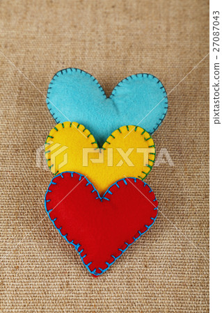 Three felt craft hearts, yellow, red and blue Three felt craft hearts, yellow, red and blue 27087043