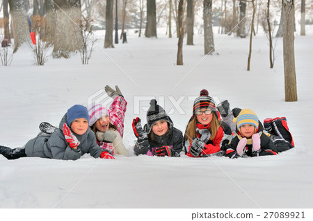 Happy children in winterwear laughing Happy children in winterwear laughing 27089921