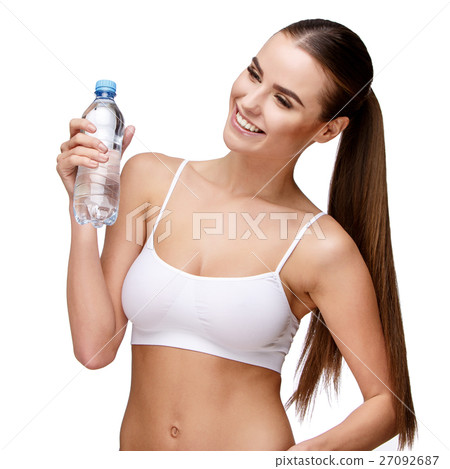 attractivesmiling woman holding bottle of water attractivesmiling woman holding bottle of water 27092687