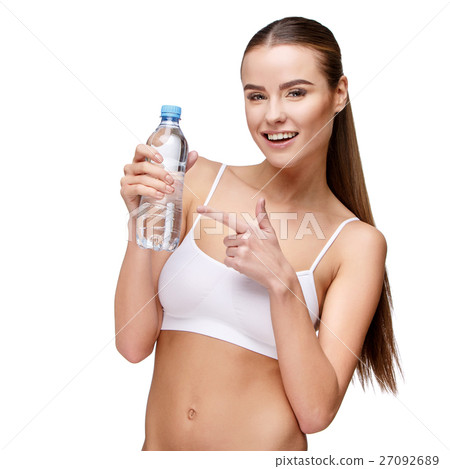 attractivesmiling woman holding bottle of water attractivesmiling woman holding bottle of water 27092689