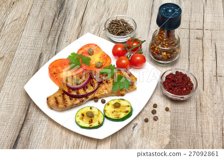 piece of roasted meat and vegetables on the plate piece of roasted meat and vegetables on the plate 27092861