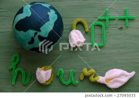 Earth hour message on green background Earth hour message on green background 27093035