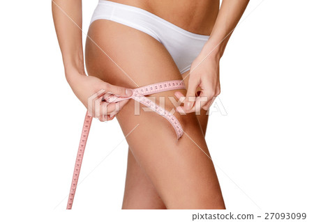 Torso of woman in white bikini sunbathing Torso of woman in white bikini sunbathing 27093099