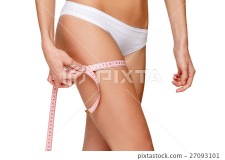 Torso of woman in white bikini sunbathing Torso of woman in white bikini sunbathing 27093101