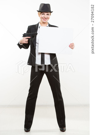 beautiful business woman with gun olding a blank beautiful business woman with gun olding a blank 27094182