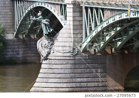Art Nouveau statue carrying torches, Cechuv Bridge 27095673