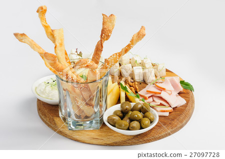 Assorted beer snack, cheeses, wallnuts and other Assorted beer snack, cheeses, wallnuts and other 27097728
