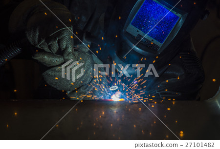 Industrial steel welder in factory Industrial steel welder in factory 27101482