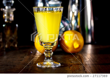 glass of Limoncello is on the table 27117369