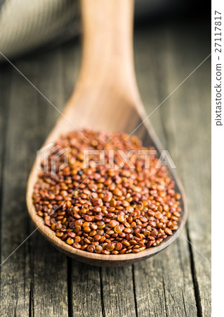 Red quinoa seeds. 27117817