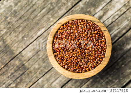 Red quinoa seeds. Red quinoa seeds. 27117818
