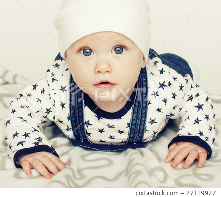 little cute baby toddler on carpet isolated close little cute baby toddler on carpet isolated close 27119927