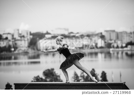 ballerina posing on a background of the lake ballerina posing on a background of the lake 27119968