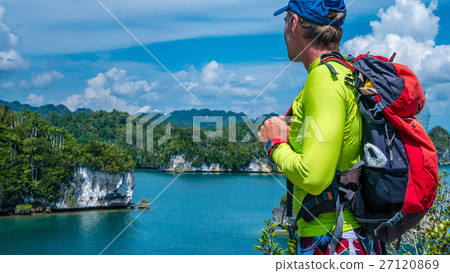 Traveler with Backpack enjoy the View, Raja Ampat Traveler with Backpack enjoy the View, Raja Ampat 27120869