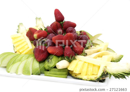 A plate of ripe fruit on a white background 27121663