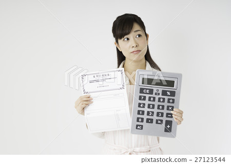 A woman looking at insurance policy A woman looking at insurance policy 27123544