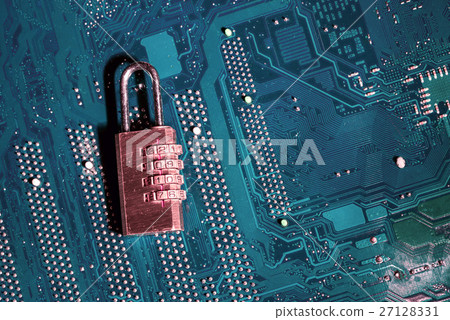 padlock on a computer circuit board 27128331