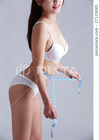 Woman measuring shape of beautiful Woman measuring shape of beautiful 27129085