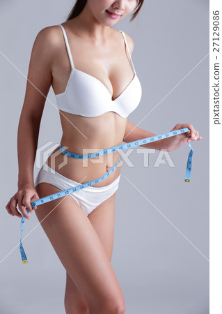 Woman measuring shape of beautiful Woman measuring shape of beautiful 27129086