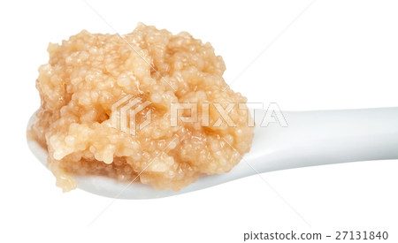 salty caviar of herring in ceramic spoon isolated salty caviar of herring in ceramic spoon isolated 27131840