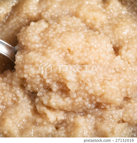 surface of salty caviar of herring fish with spoon 27132019