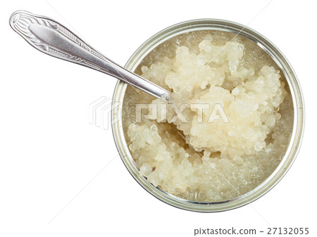 top view of open tin with halibut caviar and spoon 27132055