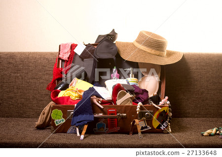 female suitcase on the couch female suitcase on the couch 27133648