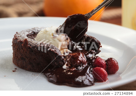 Chocolate fondant with strawberry and ice cream 27134894