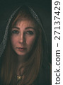 Portrait of a woman in hood 27137429
