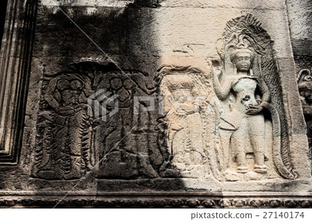 A relief of an undeveloped leftover debutter engraved on the wall of Angkor Wat 27140174