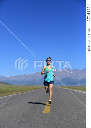 young fitness woman runner running on road young fitness woman runner running on road 27141834