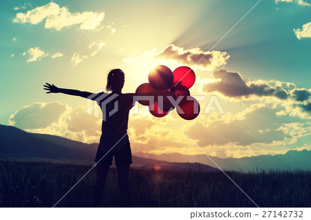 cheering youngwoman with colored balloons cheering youngwoman with colored balloons 27142732