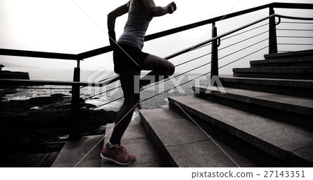 fitness woman  trail runner running on seaside 27143351
