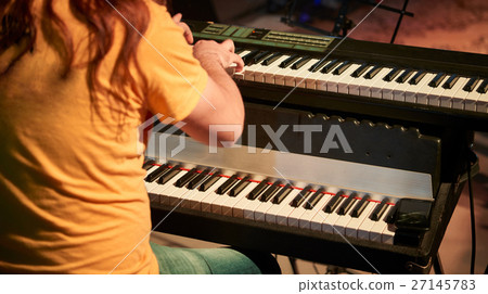 The musician at the rehearsal. 27145783