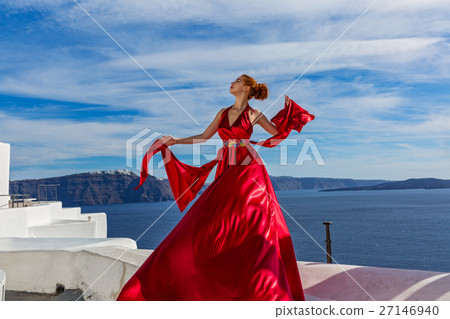Beautiful young woman in red dress Beautiful young woman in red dress 27146940