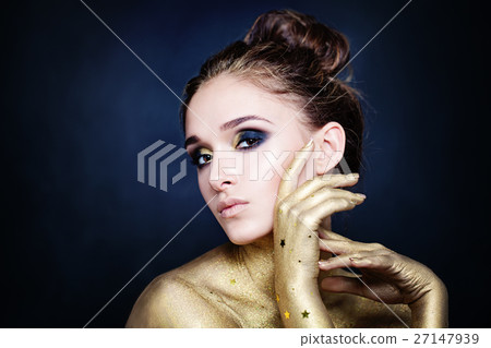 Magnificent Woman with Golden Hands on Blue 27147939