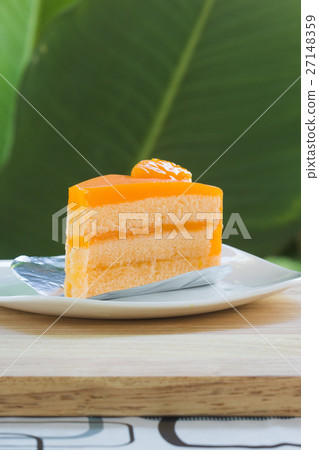 Piece of orange cake cream Piece of orange cake cream 27148359