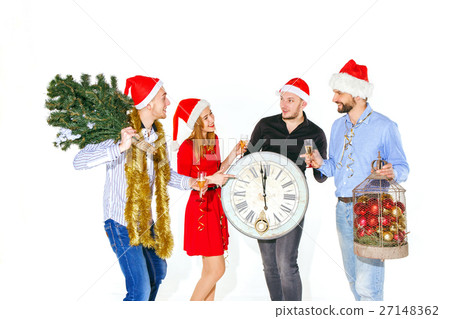 Many young women and men drinking at christmas Many young women and men drinking at christmas 27148362