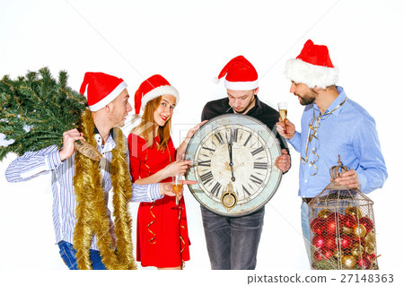 Many young women and men drinking at christmas Many young women and men drinking at christmas 27148363