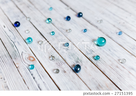 glass balls on a white vintage Wood Texture 27151395