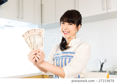 Housewife, a woman holding a bill Housewife, a woman holding a bill 27153678