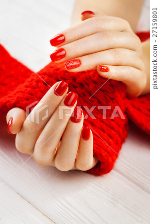 manicure with a red knitted scarf manicure with a red knitted scarf 27159801