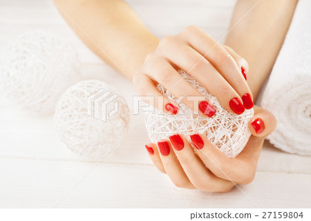 manicure with a white ball of yarn manicure with a white ball of yarn 27159804