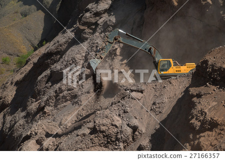Excavator in mountains 27166357