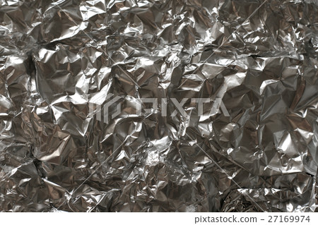 Silver foil background with shiny crumpled surface Silver foil background with shiny crumpled surface 27169974
